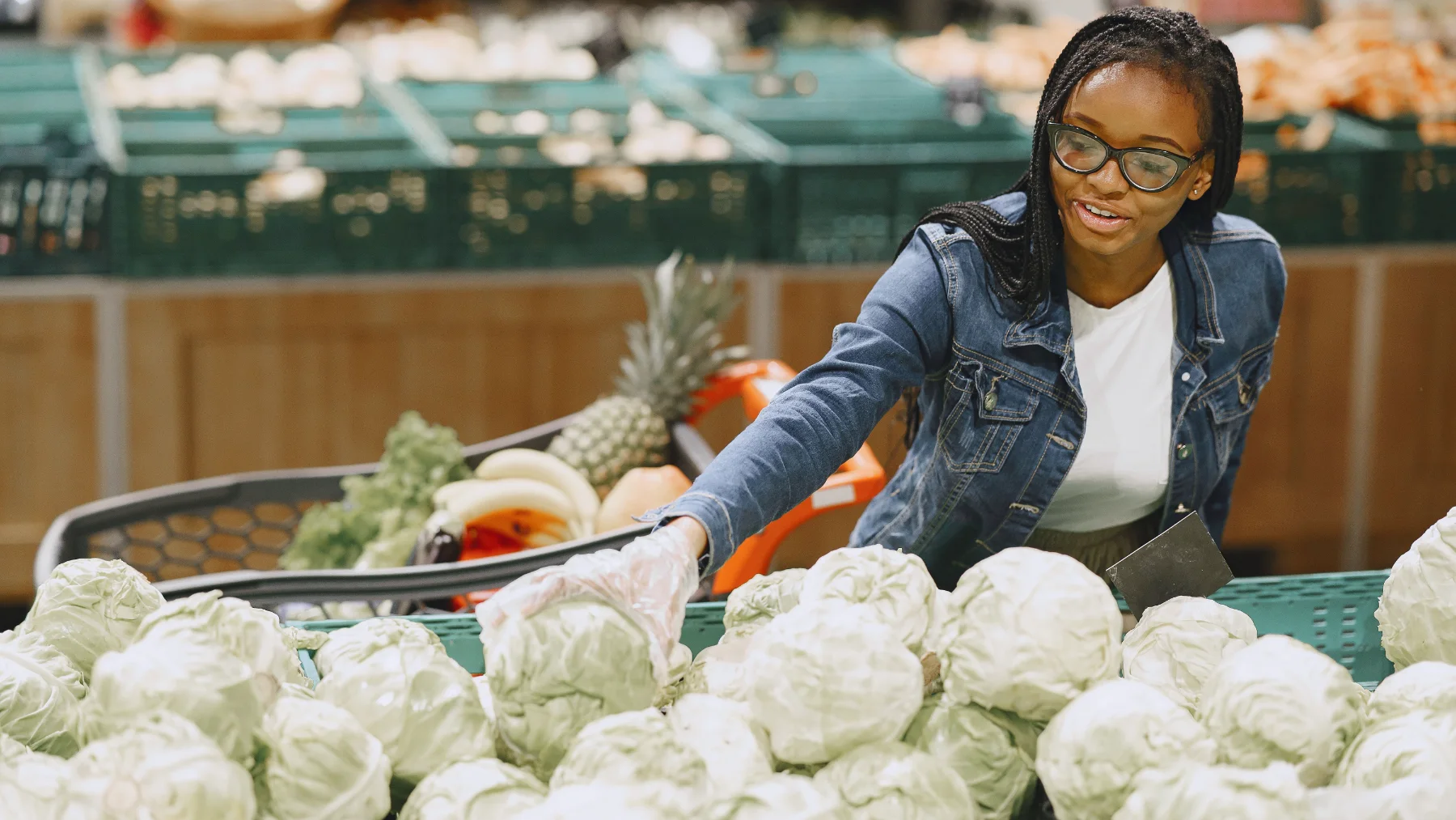 A consumer buying cabbages from a regenerative food store